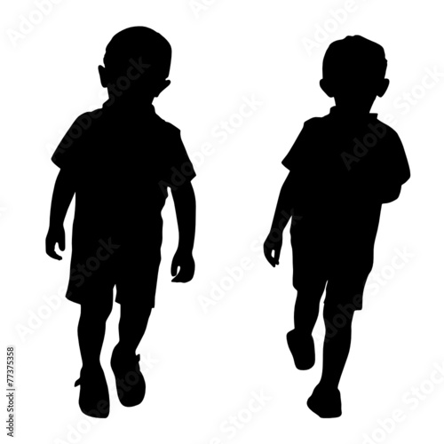 Silhouettes of two little boys who play