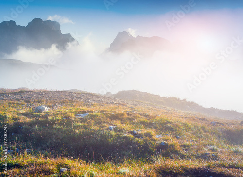 Birkenkofel mountain range in the morning mist