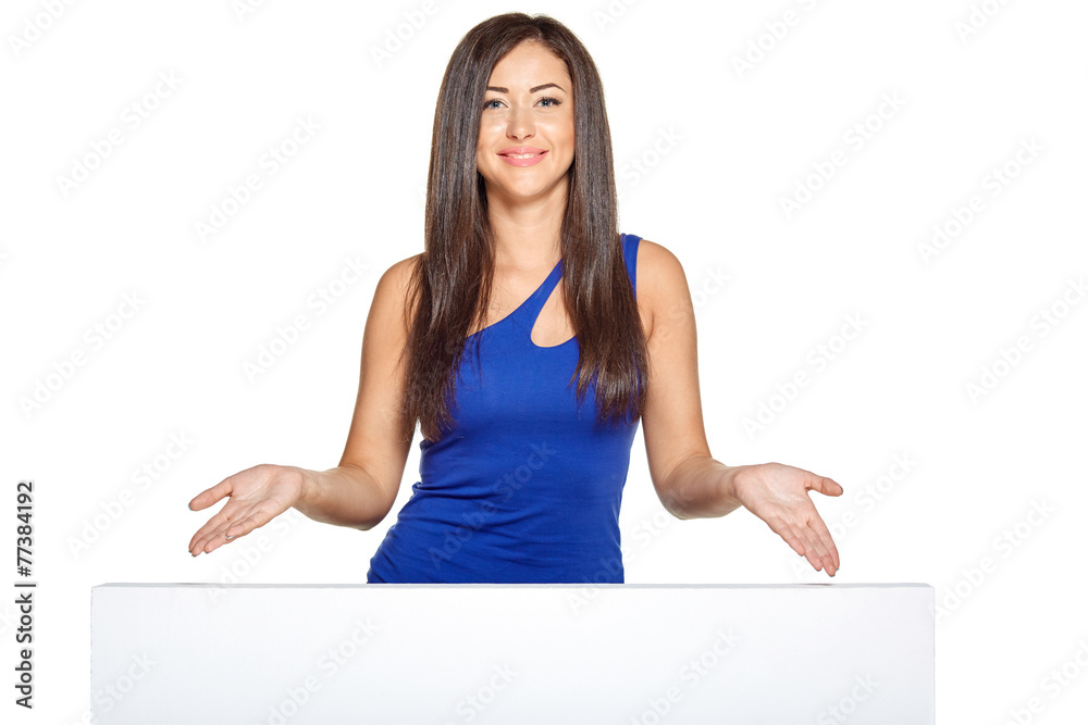 Young pretty woman peeking out from behind the wall Young pretty woman peeking out from behind the wall