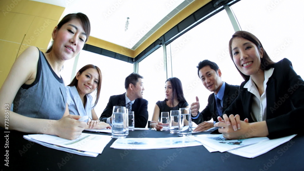 Asian Chinese Business Team Meeting via Video Uplink Asian Chinese Business Team Meeting via Video Uplink