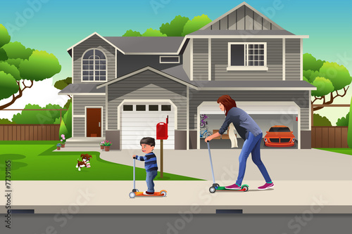Mother and son riding a scooter together