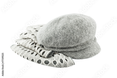 Woolen scarf and cap isolated on white background photo