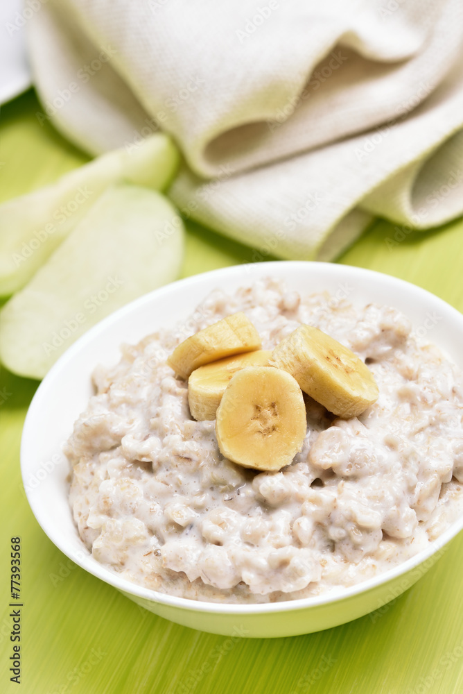 Breakfast oatmeal porridge with bananas slices Breakfast oatmeal porridge with bananas slices