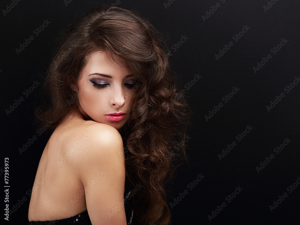 Fototapeta premium Beautiful long hair makeup woman looking down