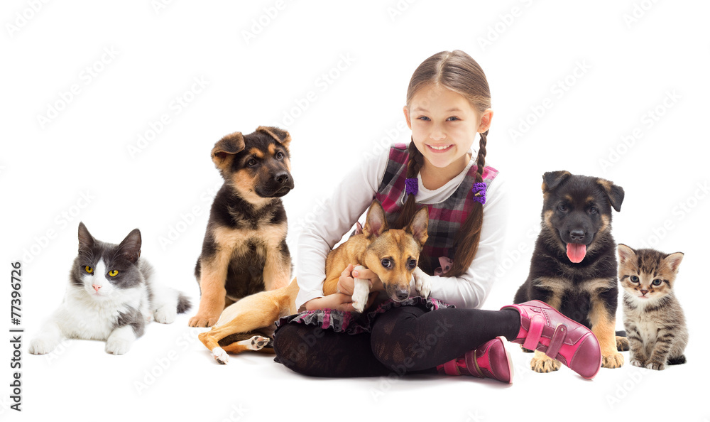 happy child and a puppy and kitten