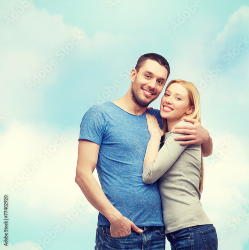 smiling couple hugging