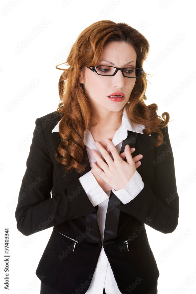Business woman having heart attack.
