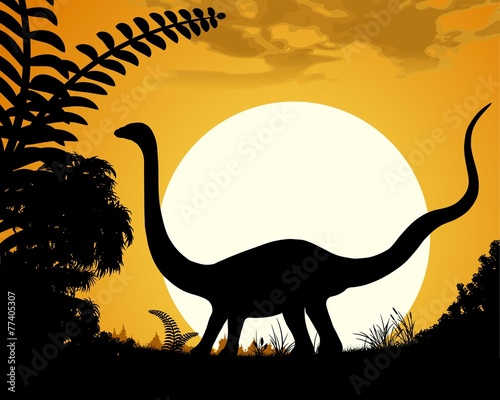 Dinosaur silhouette on sunset background.