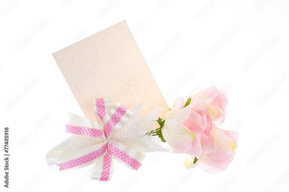 Single pink rose with some beautiful riboon and card beside, spa Single pink rose with some beautiful riboon and card beside, spa
