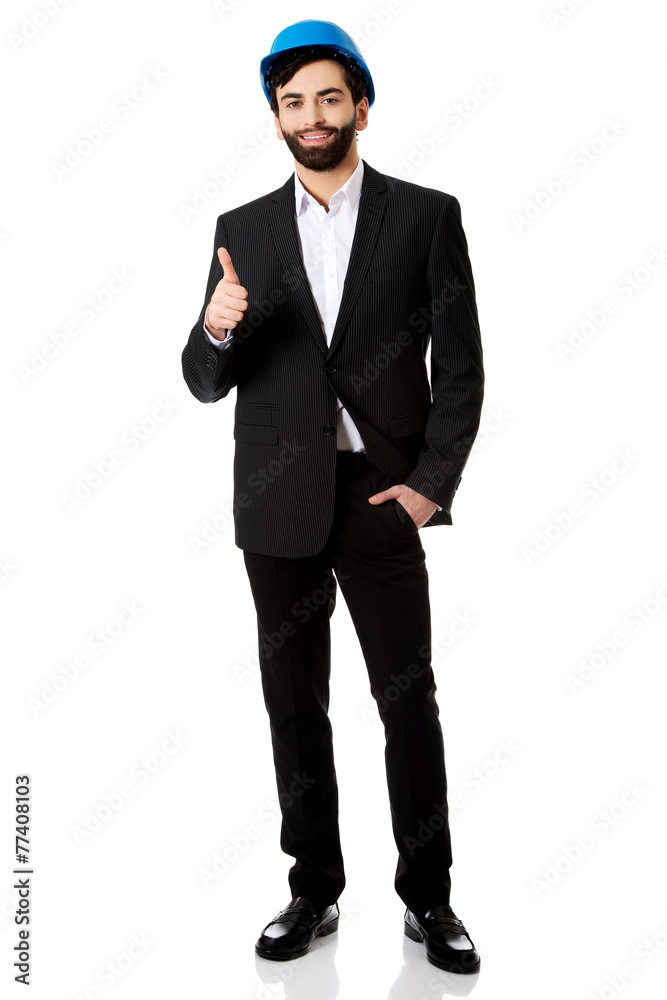 Engineer in protective helmet with thumbs up. Engineer in protective helmet with thumbs up.