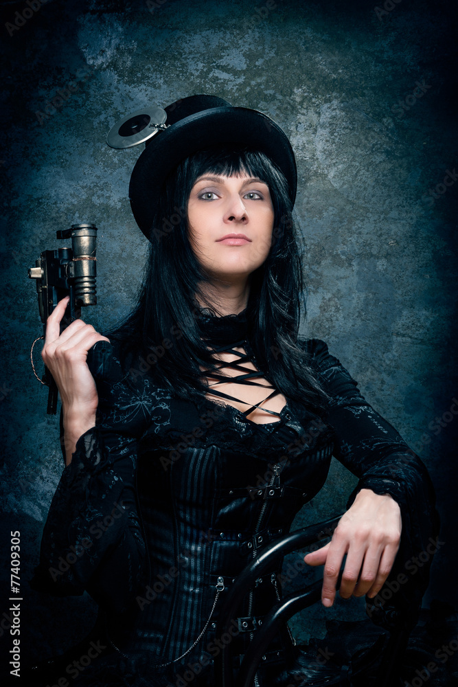 Naklejka premium lässige schönheit bewaffnet im steam punk style