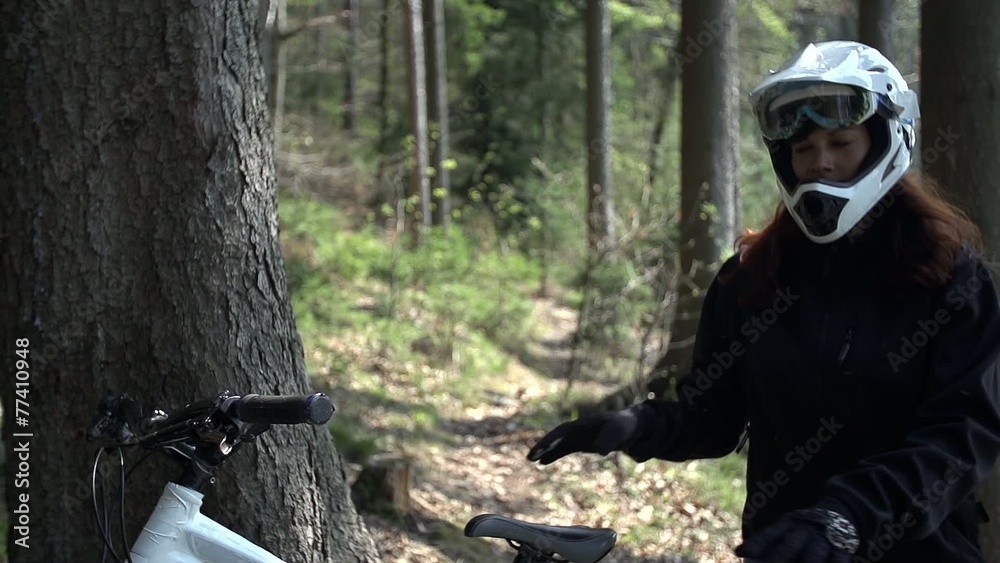 Downhill driver come to the bike while Downhill driver come to the bike while