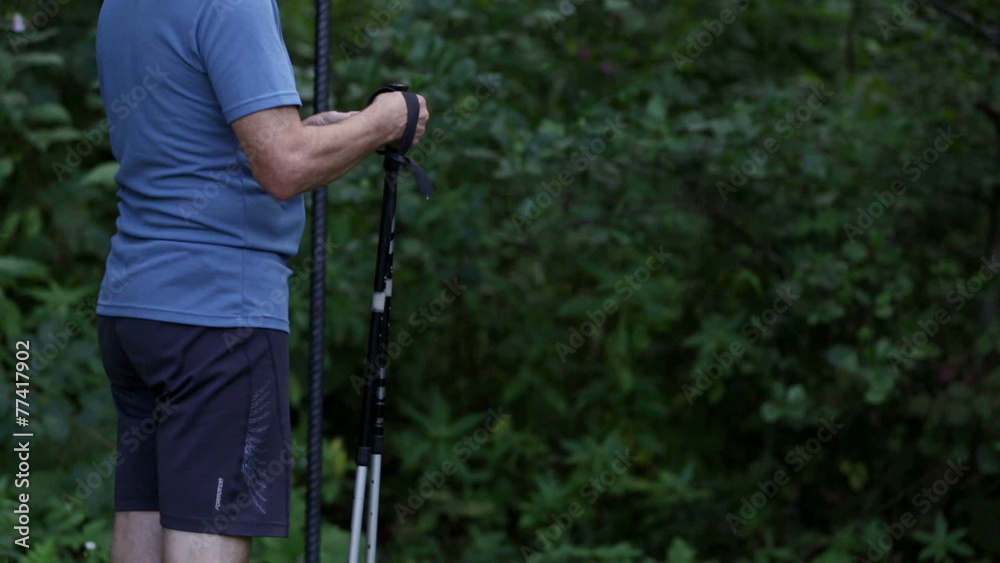Trekker grabs his poles and starts the tour Trekker grabs his poles and starts the tour