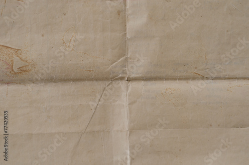 Very old crumpled brown paper texture.