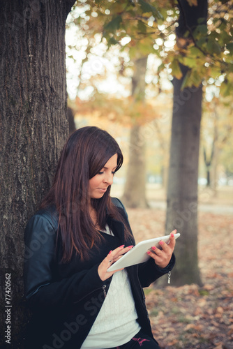 young beautiful brunette straight hair woman in the park © Eugenio Marongiu