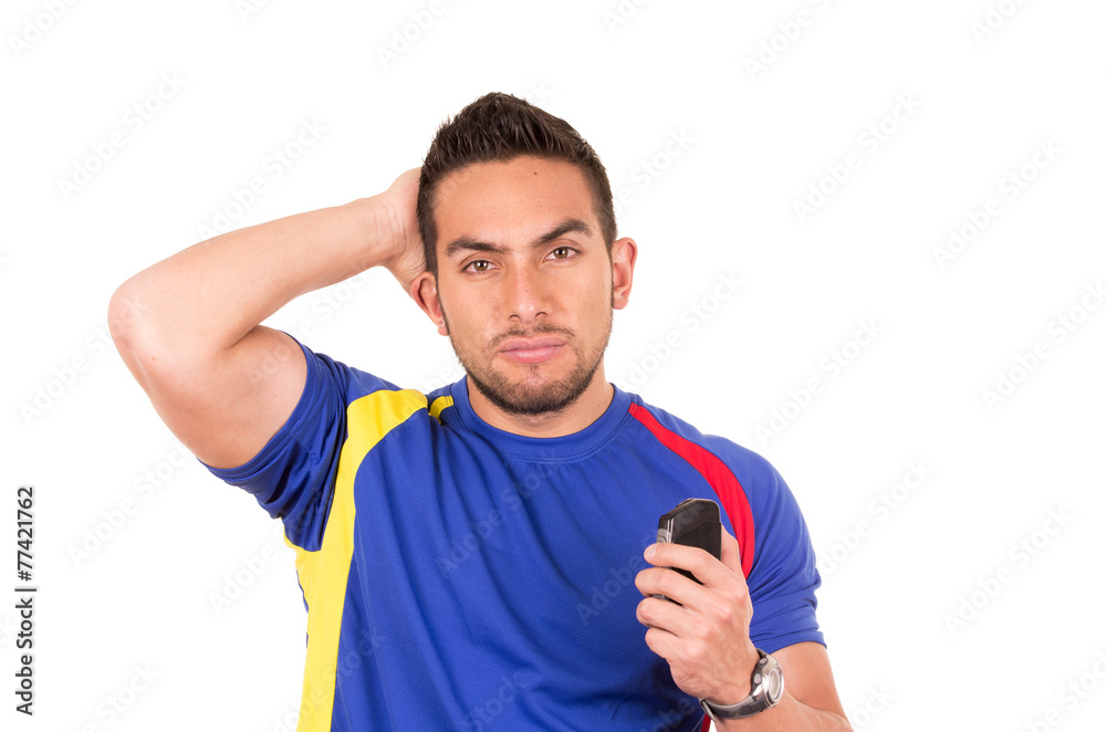 angry soccer fan wearing blue t-shirt watching game angry soccer fan wearing blue t-shirt watching game