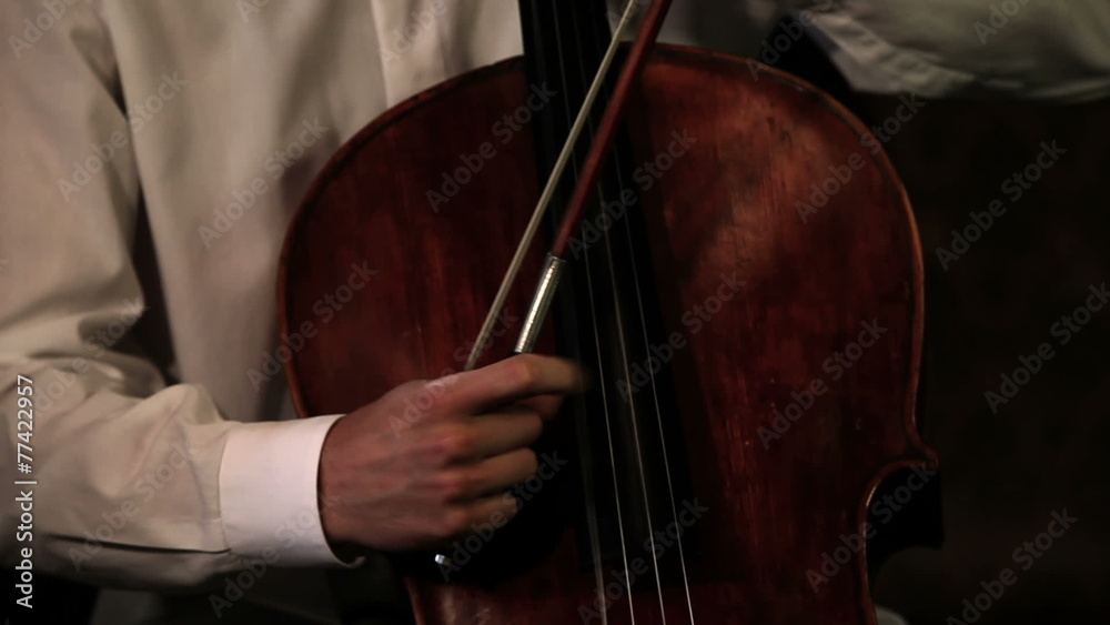 Close up pan shot of a bass player Close up pan shot of a bass player