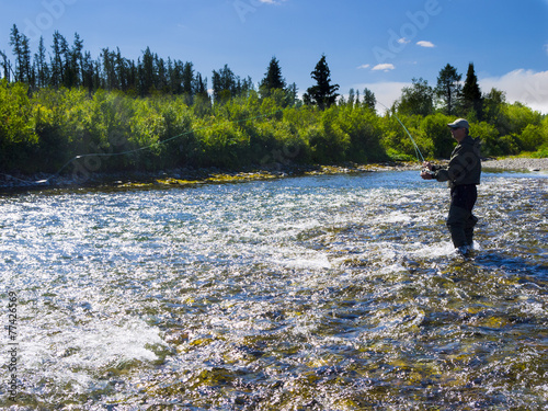 A fisherman on the river