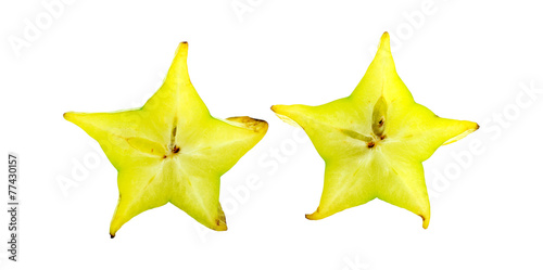 Pair of star fruit slices isolated on white