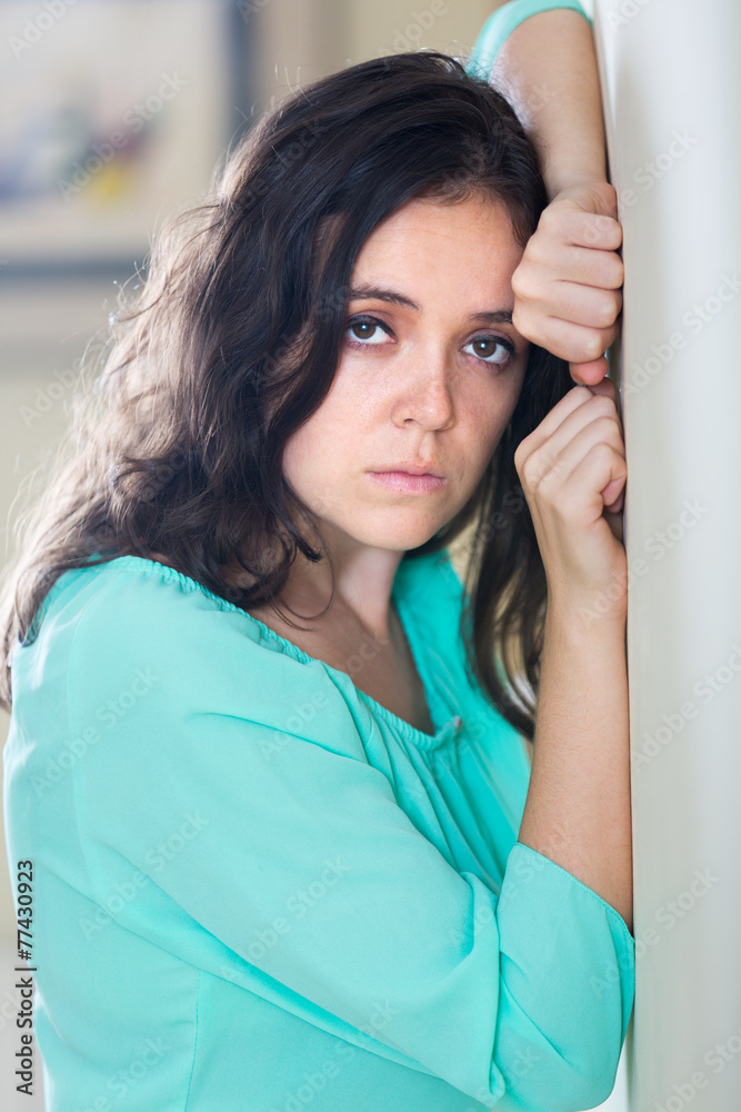 Fototapeta premium Depressed crying woman at home
