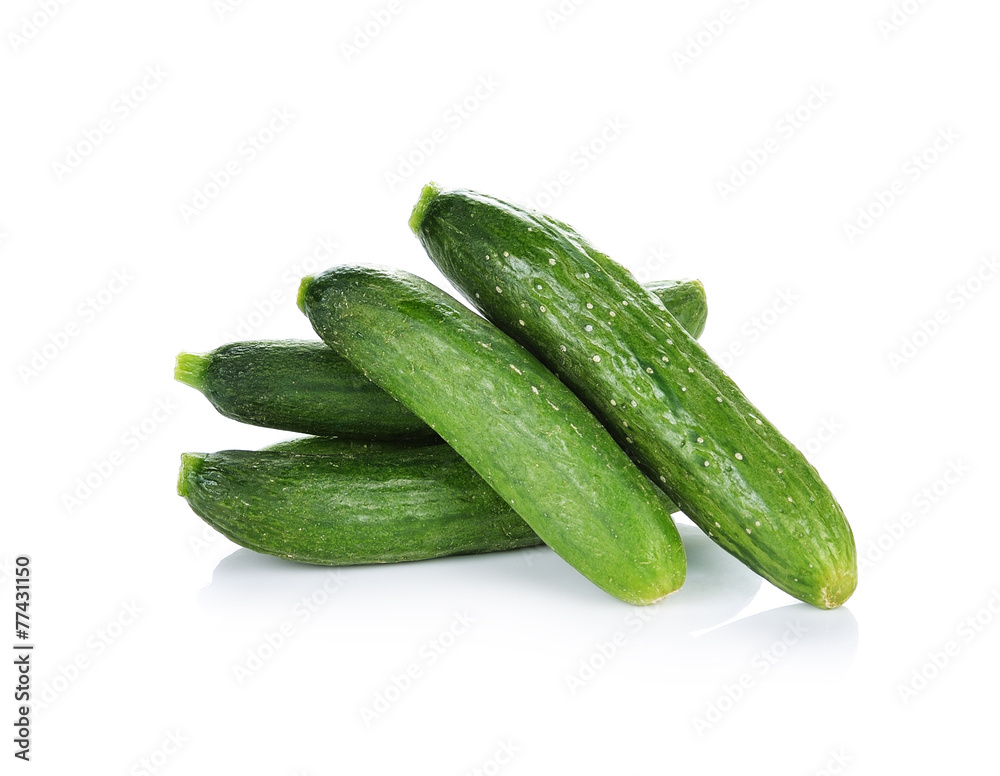 fresh green baby cucumbers on white background fresh green baby cucumbers on white background