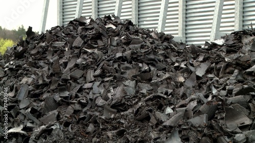 shredded car tires pile for recycling. sequence.