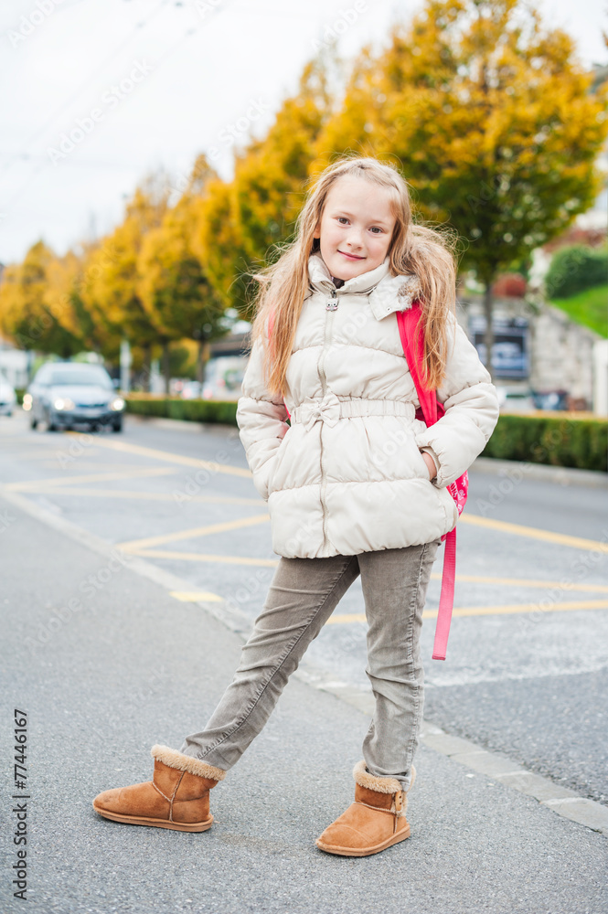 Pretty little girl with backpack ready to go to school Pretty little girl with backpack ready to go to school