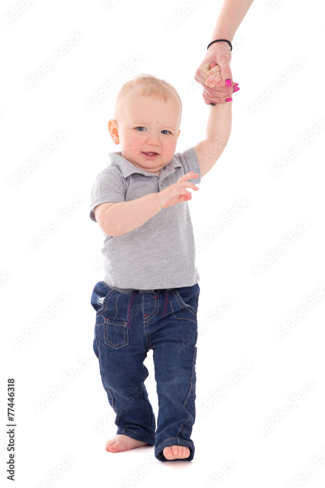 little baby boy walking and holding mother's hand isolated on wh little baby boy walking and holding mother's hand isolated on wh