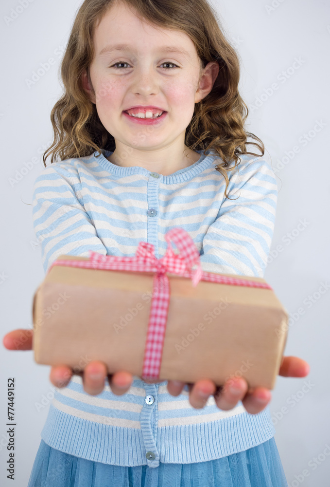 girl giving present