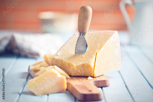 Canvas Print parmesan cheese on cutting board