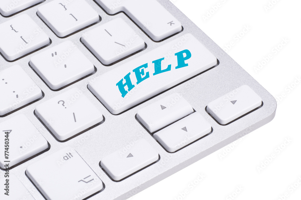 A computer Help Key. White keyboard A computer Help Key. White keyboard