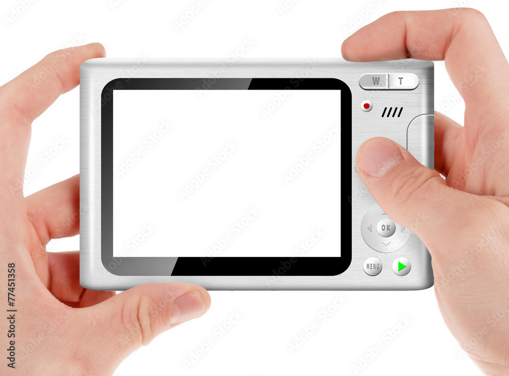 Hand holding a compact digital camera with empty LCD screen Hand holding a compact digital camera with empty LCD screen