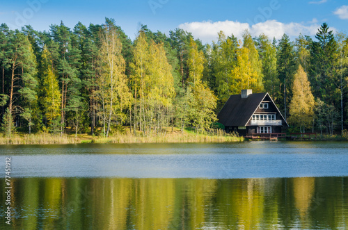 Autumn landscape on the lake in the woods