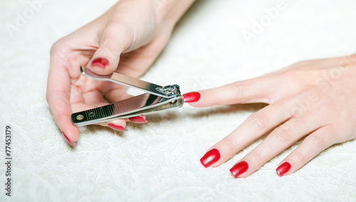 Hand manicure with nail clipper