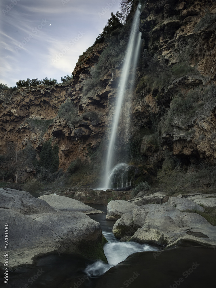 Obraz premium Landscape with a waterfall