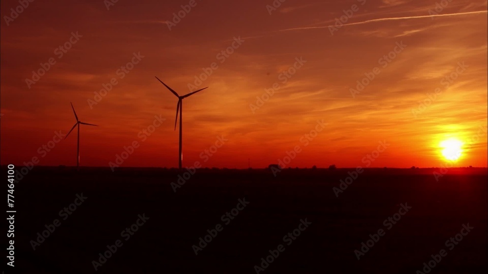 Windmills at sunset background - interval Windmills at sunset background - interval