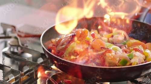 Flaming vegetables and chicken.