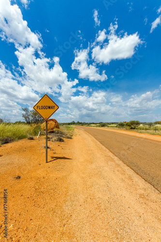 Photography Australian Desert road with floodway sign