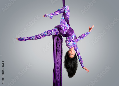 Beautiful dancer on aerial silk, aerial contortion, aerial ribbo