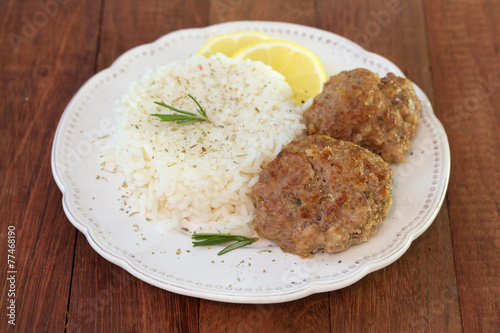 meatballs with boiled rice and lemon