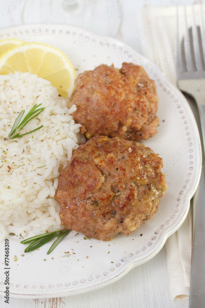 meatballs with rice on white plate meatballs with rice on white plate