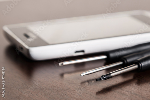 Smartphone and small screwdrivers