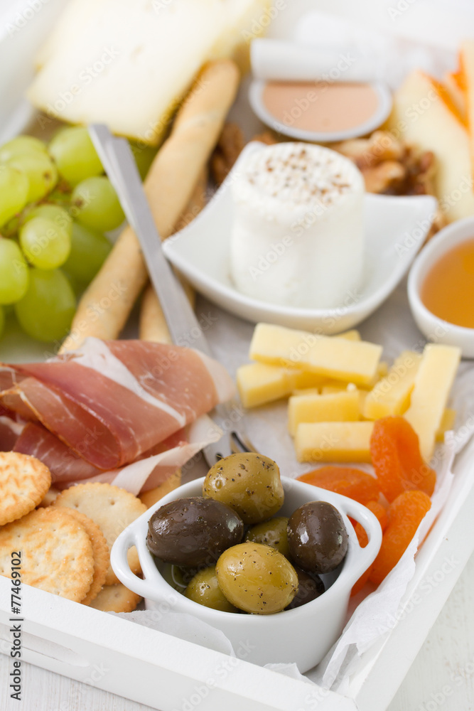 olives with fresh cheese, honey, nuts and grape olives with fresh cheese, honey, nuts and grape