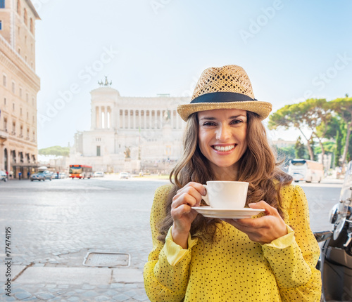 Photography Portrait of happy young woman with cup of coffee in Rome