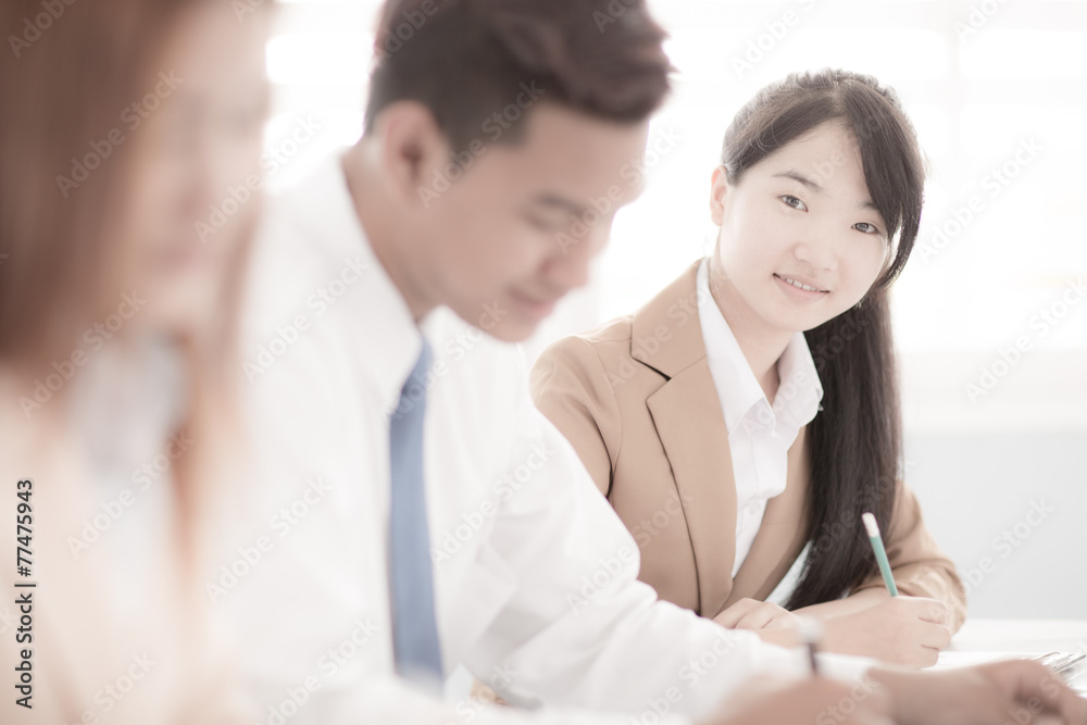 Business people discussing the charts and graphs showing the res Business people discussing the charts and graphs showing the res
