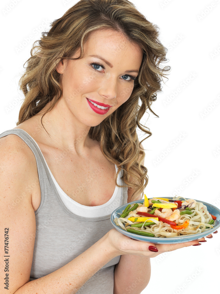Young Woman Eating a Prawn and Noodle Salad