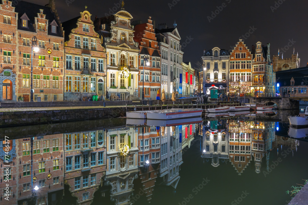 Quay Korenlei with reflections in Ghent town at night, Belgium
