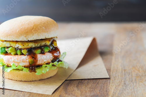 Wallpaper Mural Homemade fish burger with salmon, avocado and pineapple.Close up Torontodigital.ca