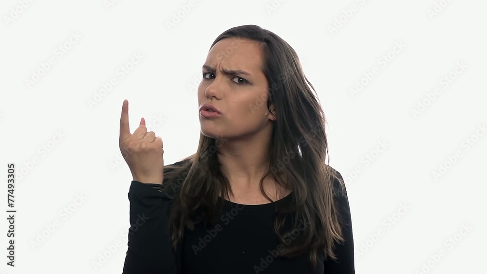 Woman angry and displeased on white background Woman angry and displeased on white background