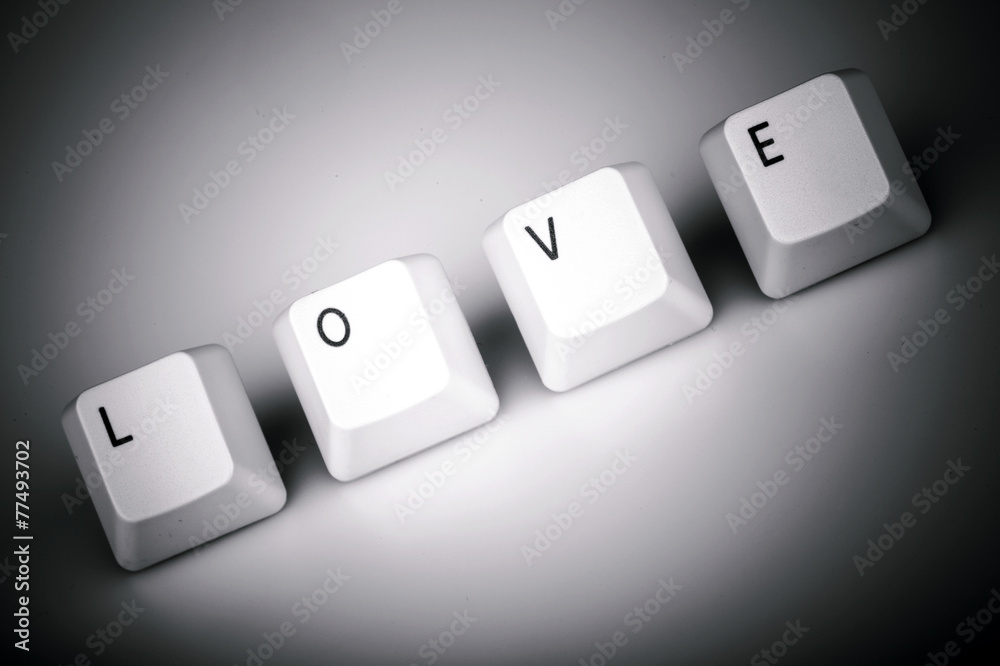 text love formed with computer keyboard keys on white background text love formed with computer keyboard keys on white background